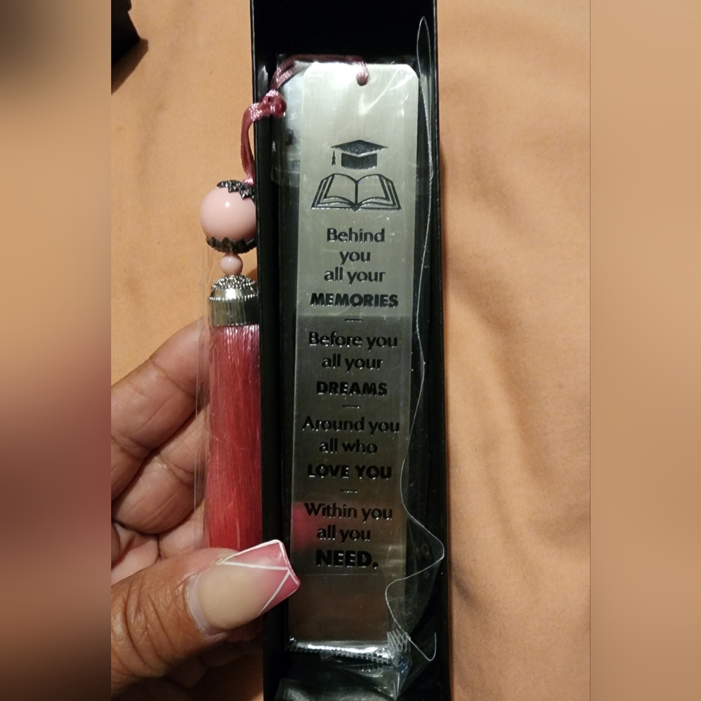 metal bookmark with pink tassel comes new in giftbox ready to gift!